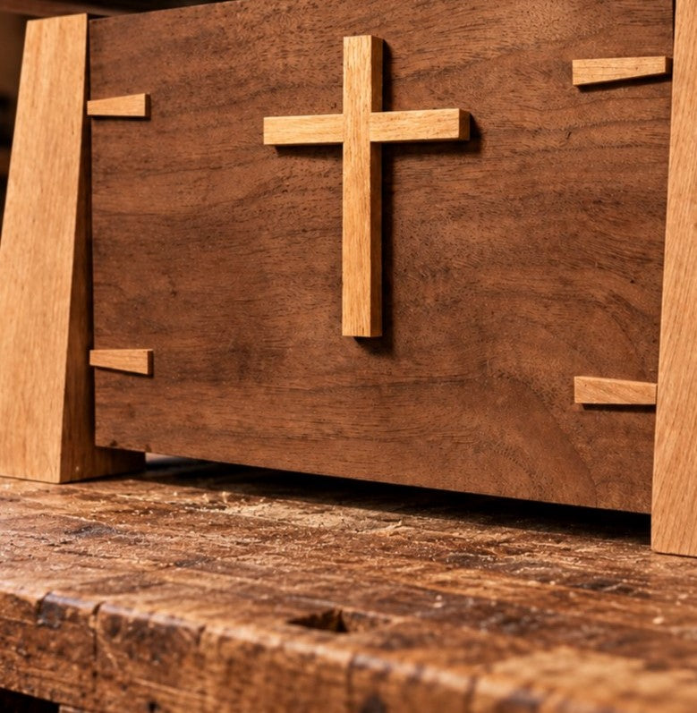 memorial urn on a woodshop bench