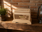 Wooden urn with American flag and eagle design on a fireplace mantle. Handcraft intarsia and carving work