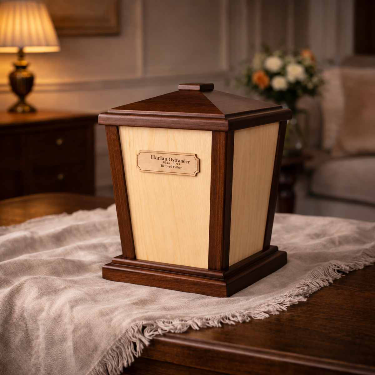 Lanternwood Maple and Walnut handcrafted cremation urn with a personalized engraved maple wood plaque on the front panel